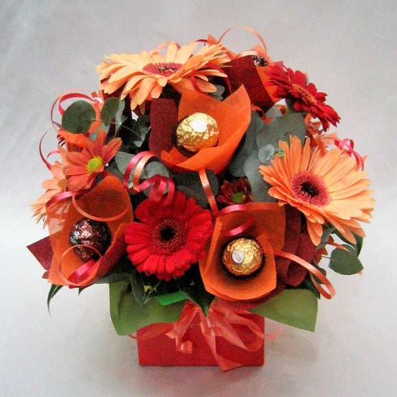Chocolate box with fresh flowers